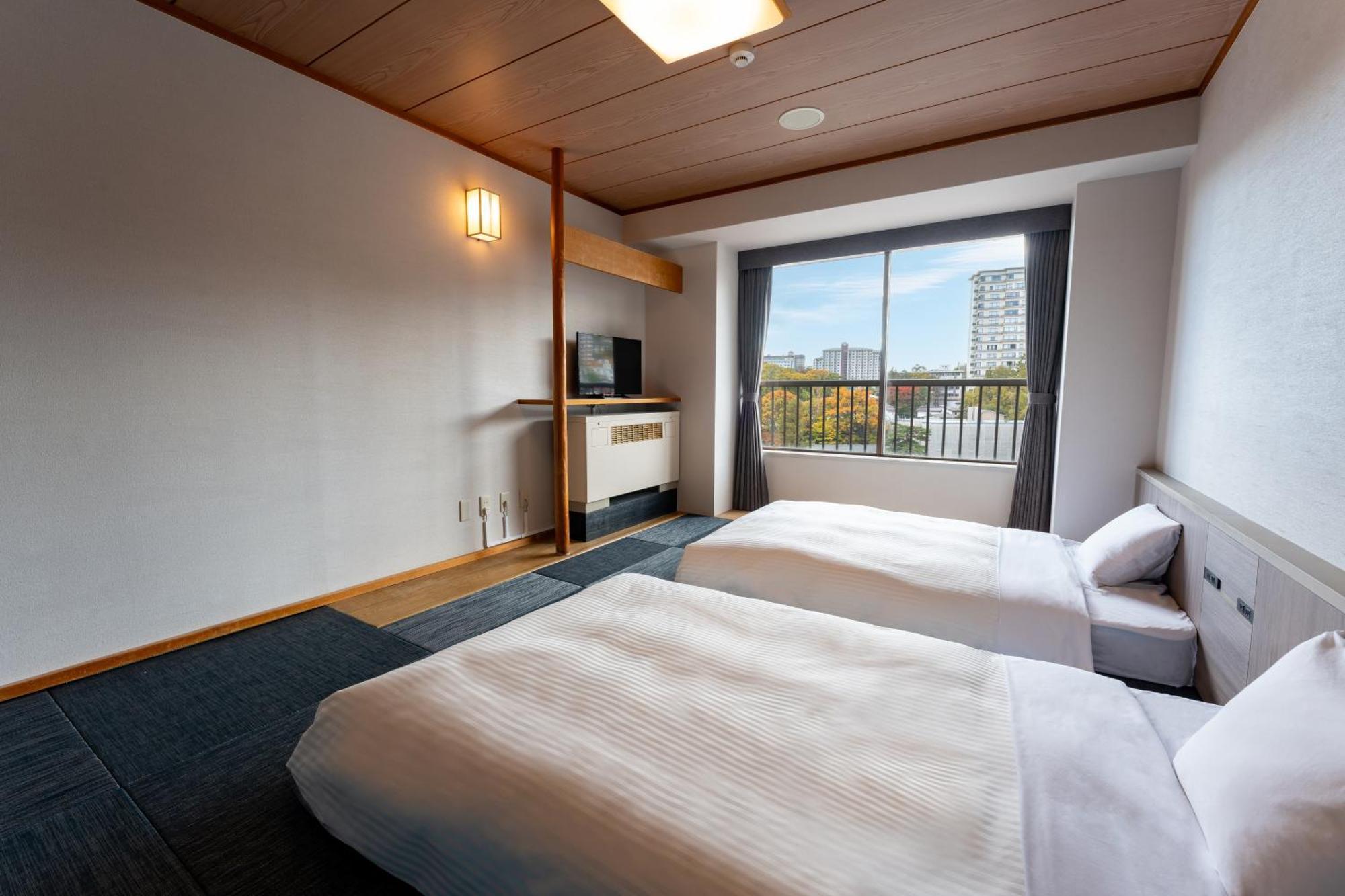 Kamenoi Hotel Kusatsu Yubatake Esterno foto